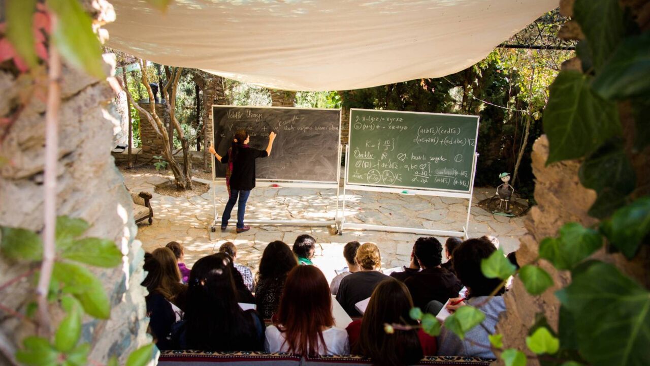 Students attend a lecture in this undated image at the Nesin's Mathematics Village.