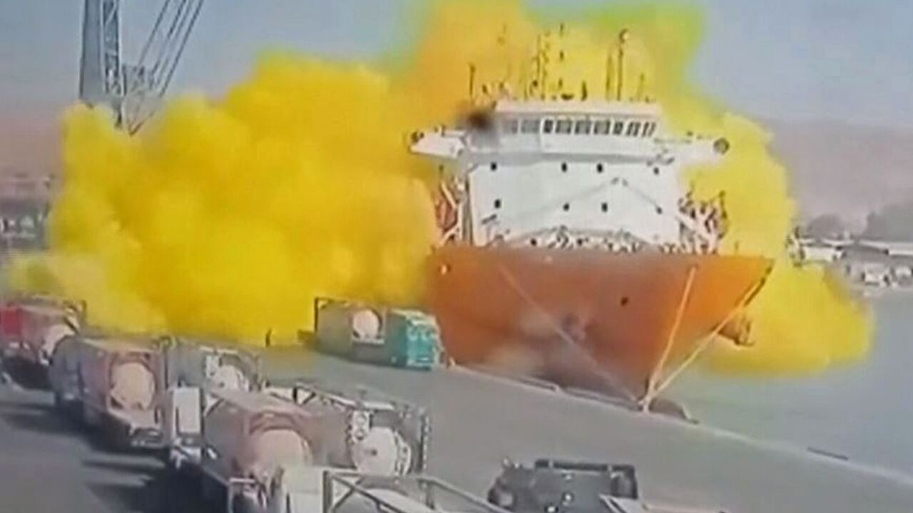 Footage on state TV showed a large cylinder plunging from a crane on a moored vessel, causing a violent explosion of yellow gas in Jordan's Aqaba port 