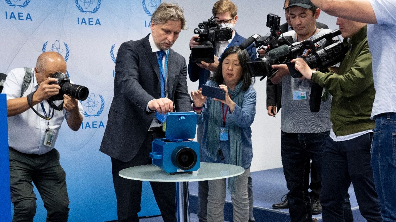 A demonstration of a nuclear activities monitoring camera used by the International Atomic Energy Agency in Iran.