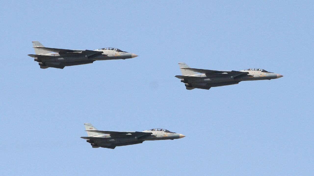 Iranian air force US-made F-14 fighter jets perform during a parade on the country's Army Day, on April 18, 2017, in Tehran