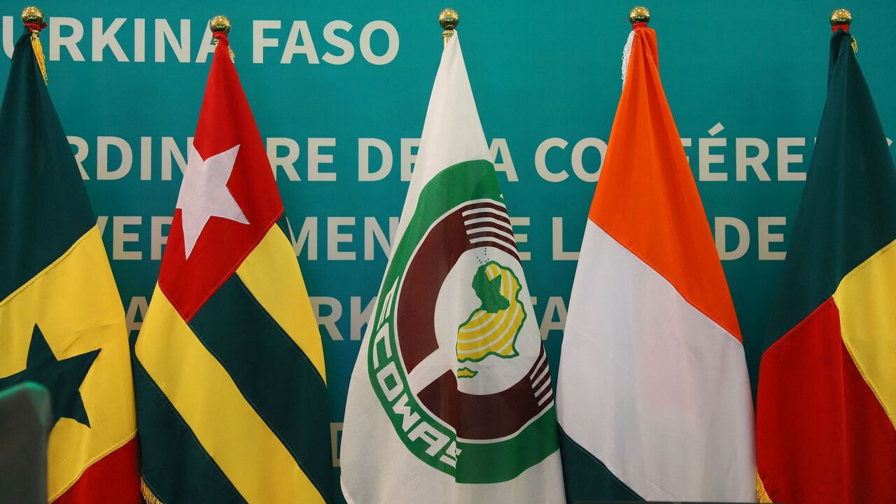 ECOWAS flag with various member flags.
