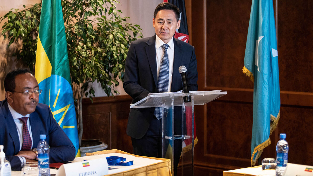 Xue Bing (C), China's special envoy to the Horn of Africa, speaks as Redwan Hussein, national security adviser to the prime minister of Ethiopia looks on during the first Horn of Africa peace conference, Addis Ababa, Ethiopia, June 20, 2022.