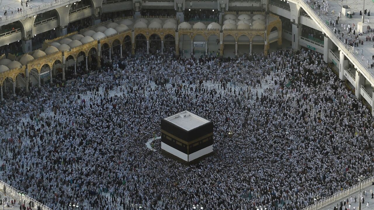 The Kaaba is a large black cubic structure at the centre of Mecca's Grand Mosque towards which Muslims turn to pray wherever they are in the world