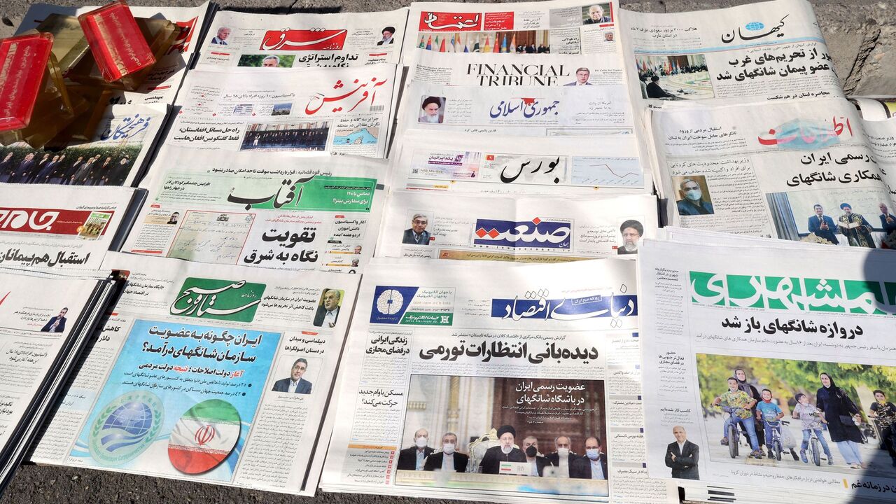Conservative and reformist newspapers in Tehran on Sept. 18, 2021.