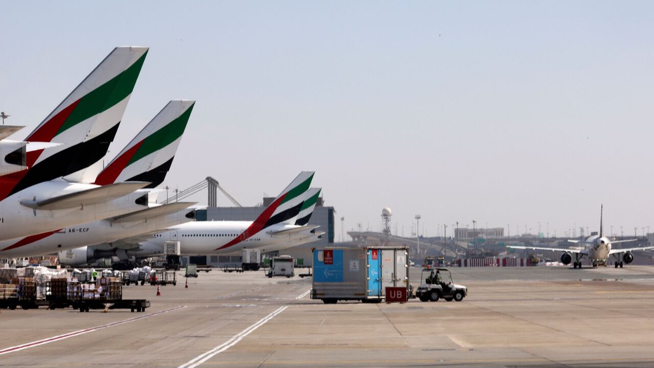 An Emirates Airlines Boing 777 plane unload a coronavirus vaccine shipment at Dubai International Airport on February 1, 2021 as key transport hub Dubai announced an initiative to accelerate the delivery of coronavirus vaccines, particularly to developing nations. - The Vaccine Logistics Alliance, which includes Dubai-based Emirates airline and global logistics giant DP World, is designed to "speed up distribution of Covid-19 vaccines around the world through the emirate". The alliance will "support" the Wo