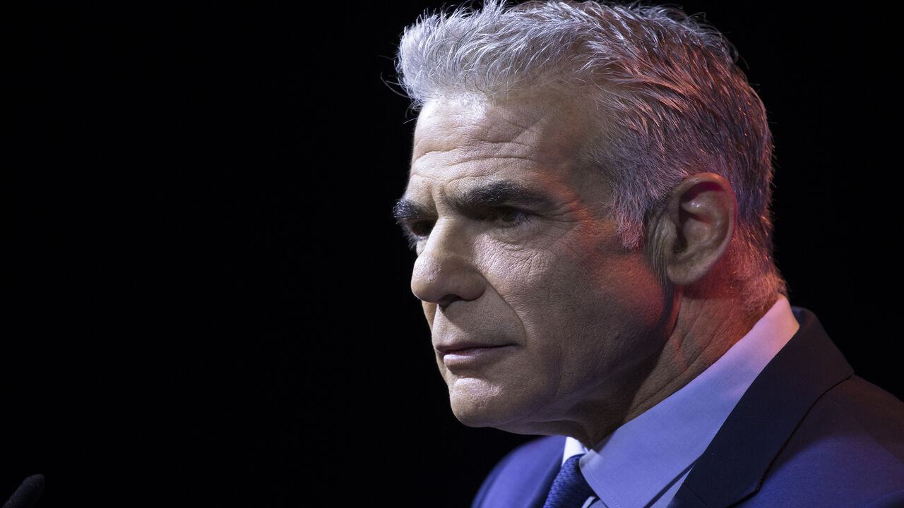 Israeli Prime Minister and Yesh Atid party leader Yair Lapid speaks during the party's opening election campaign rally ahead Israel's general elections, Tel Aviv, Israel, Aug. 3, 2022.