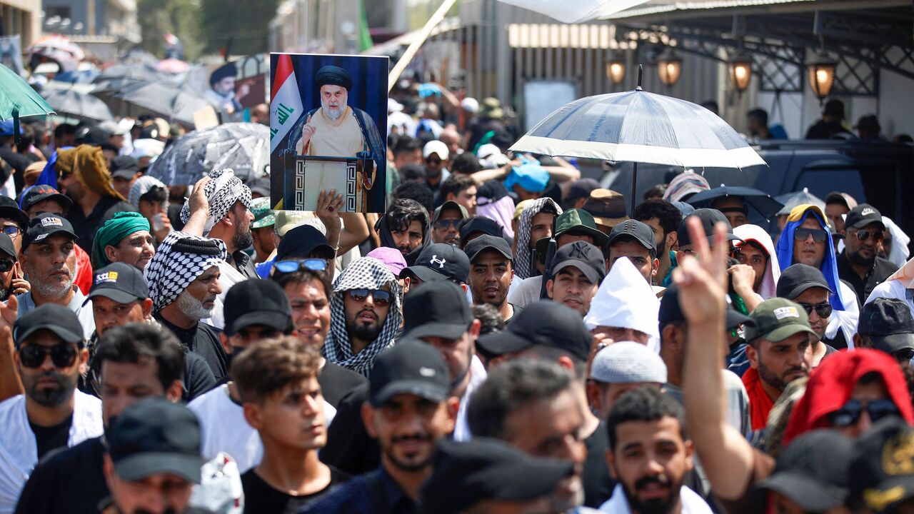 Supporters of Shiite cleric Muqtada al-Sadr gather outside the Iraqi parliament in the Green Zone in the capital Baghdad, on the seventh day of protests against the nomination of a rival Shiite faction for the position of prime minister in the heavily-guarded Green Zone, on Aug. 5, 2022. 