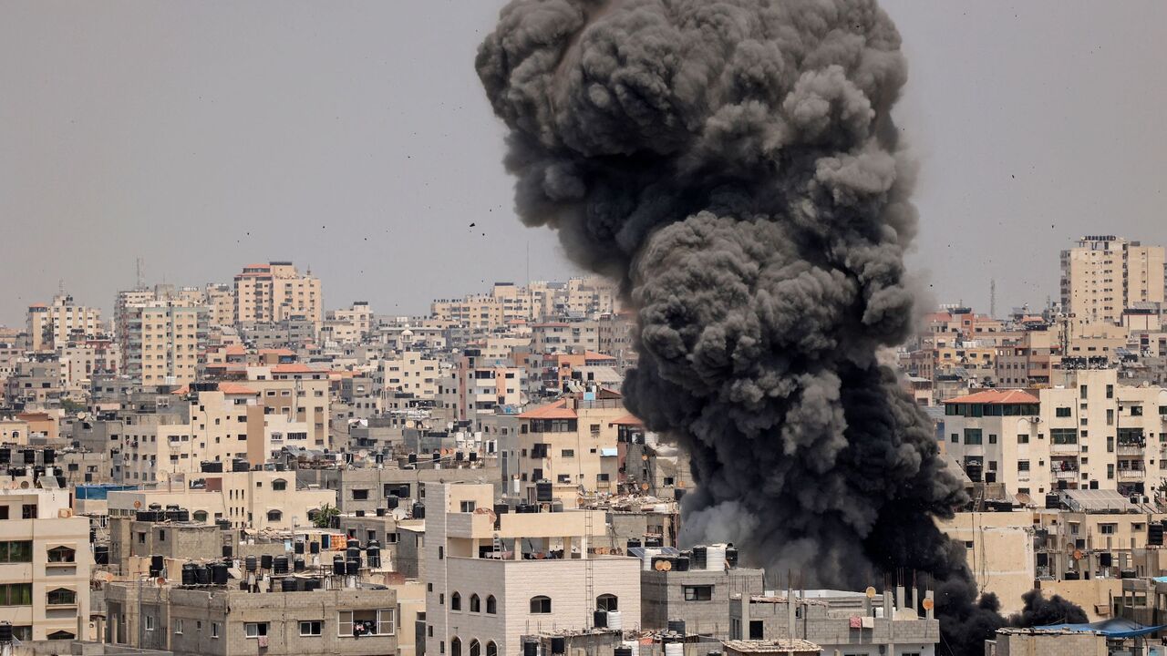 Smoke billows from an Israeli air strike in Gaza City on Aug. 6, 2022.