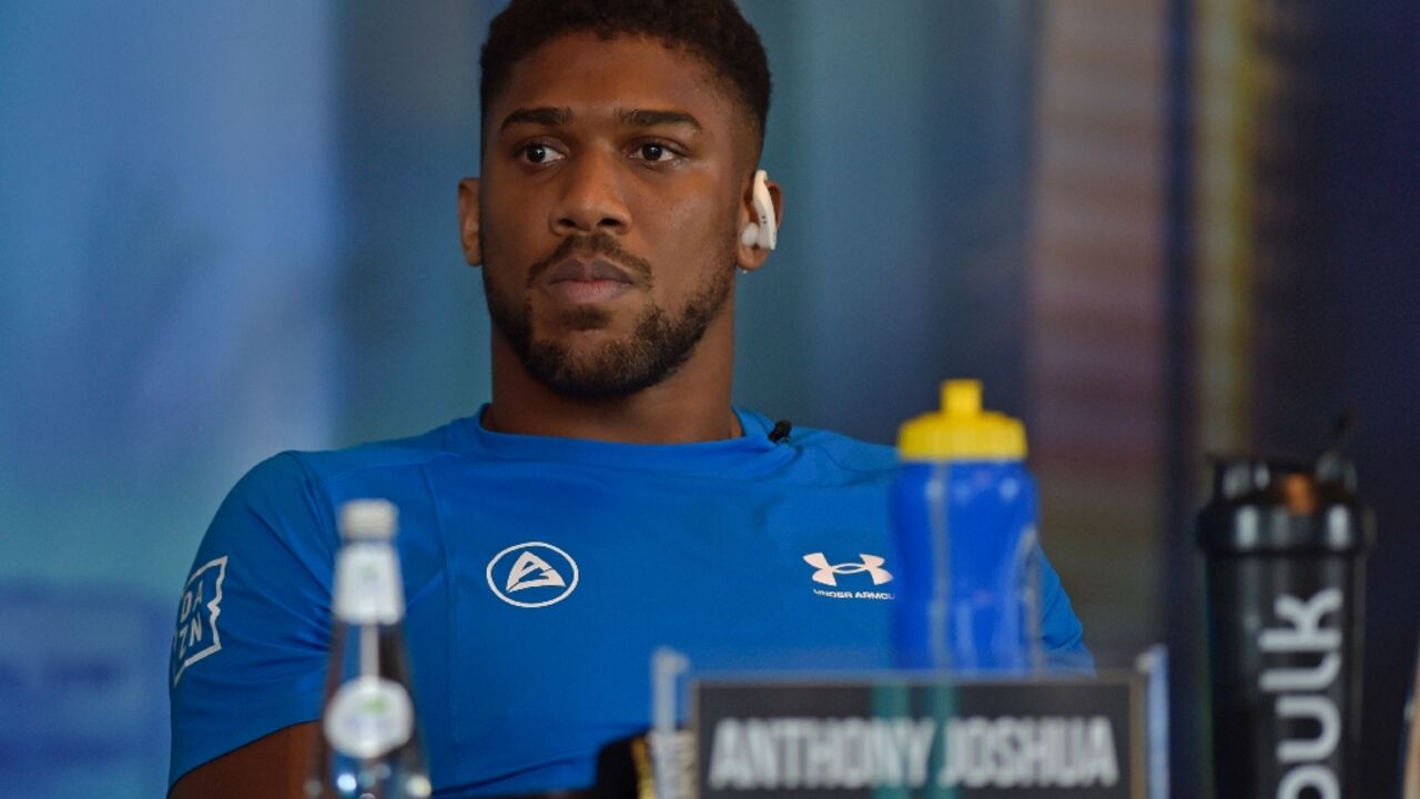 British boxer Anthony Joshua attends a press conference ahead of the heavyweight boxing rematch for the WBA, WBO, IBO and IBF titles in Jeddah