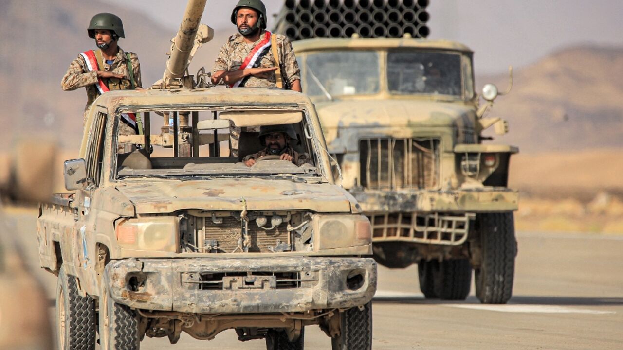 Yemenin pro-government forces take part in a parade in June: rival forces have been observing a fragile truce since April