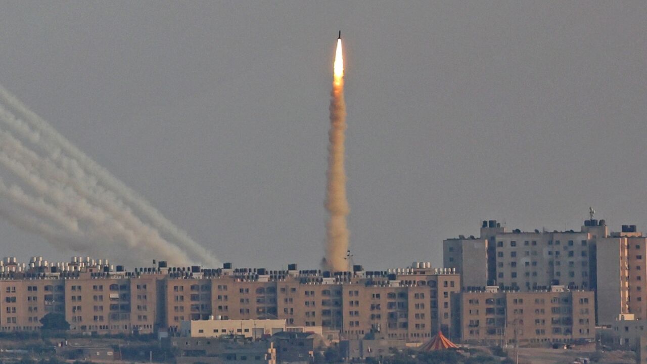 This picture taken from the southern Israeli city of Ashkelon shows Palestinian rockets fired from the Gaza Strip on August 7, 2022 -- Israel insisted some militant rockets misfired with deadly results, and some Palestinian residents agreed