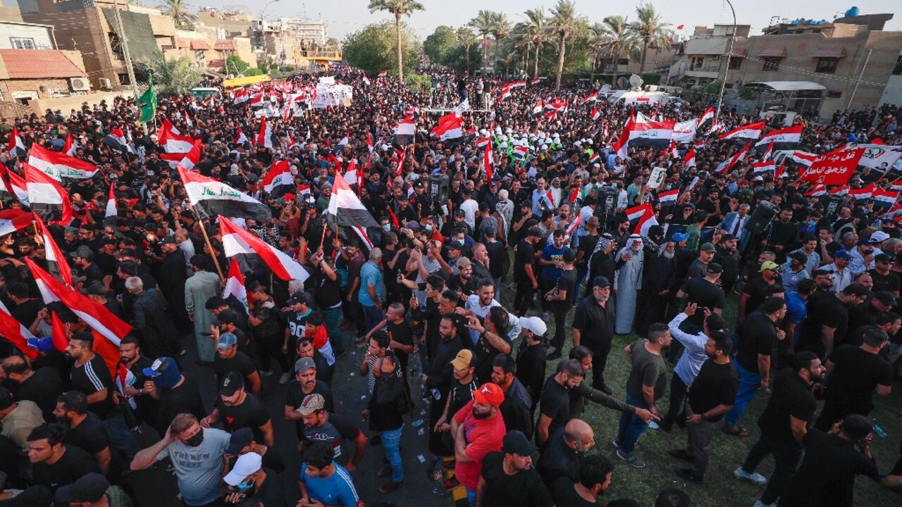 Supporters of Iraq's Coordination Framework rally outside Baghdad's high-security Green Zone