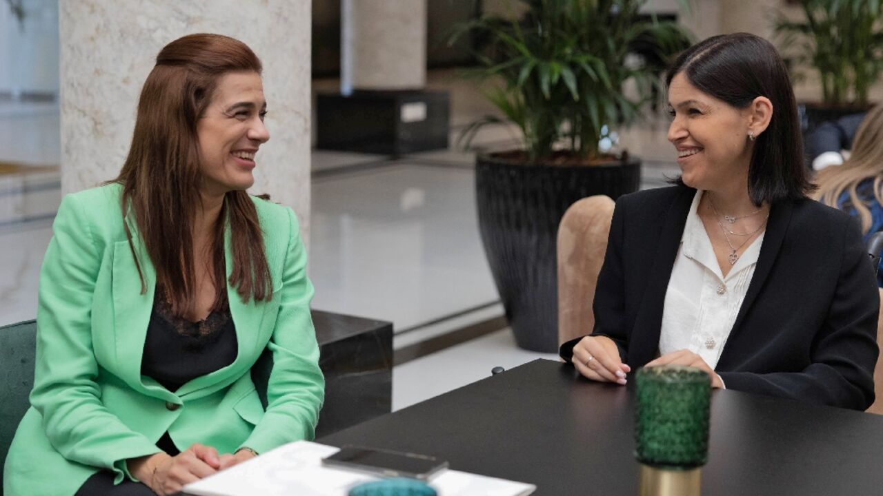 Cyprus Energy Minister Natasa Pilides, on the left, meets her Israeli counterpart Karine Elharrar in Nicosia on September 19, 2022