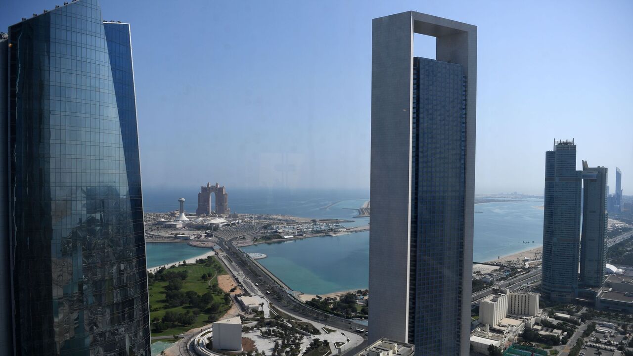 A general view taken on May 29, 2019, shows the seafront promenade in the Emirati capital, Abu Dhabi, with the ADNOC headquarters.