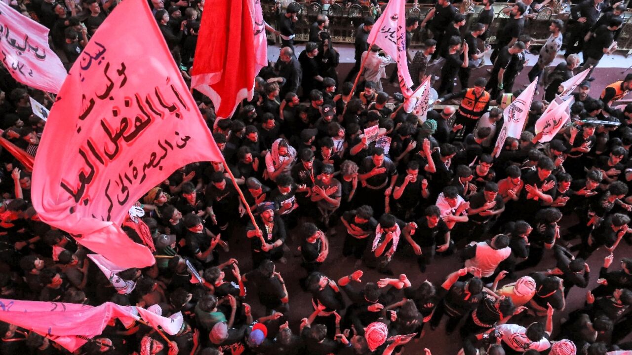 Shiite Muslims gather in Iraq's shrine city of Karbala, to  mark 40 days after the holy day of Ashura commemorating the seventh century killing of Imam Hussein