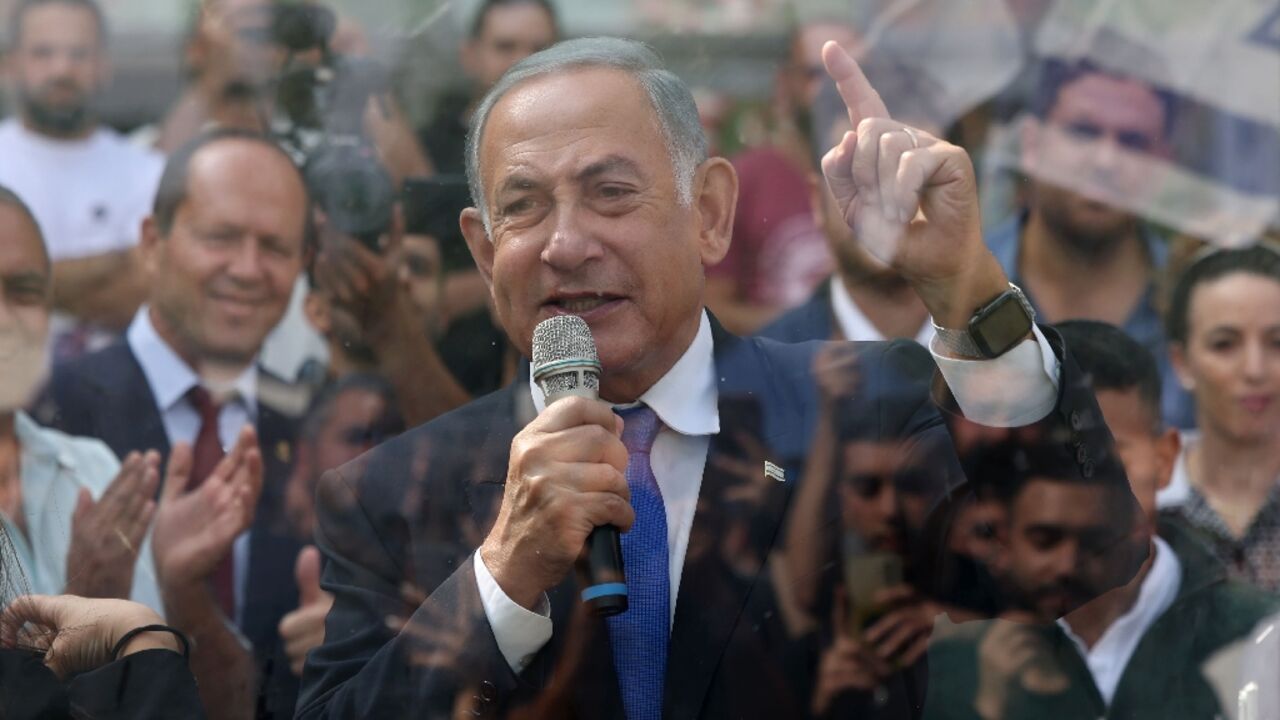 Israel's former prime minister and leader of the Likud party Benjamin Netanyahu speaks at a rally in the central West Bank settlement of Ariel, on October 26, 2022
