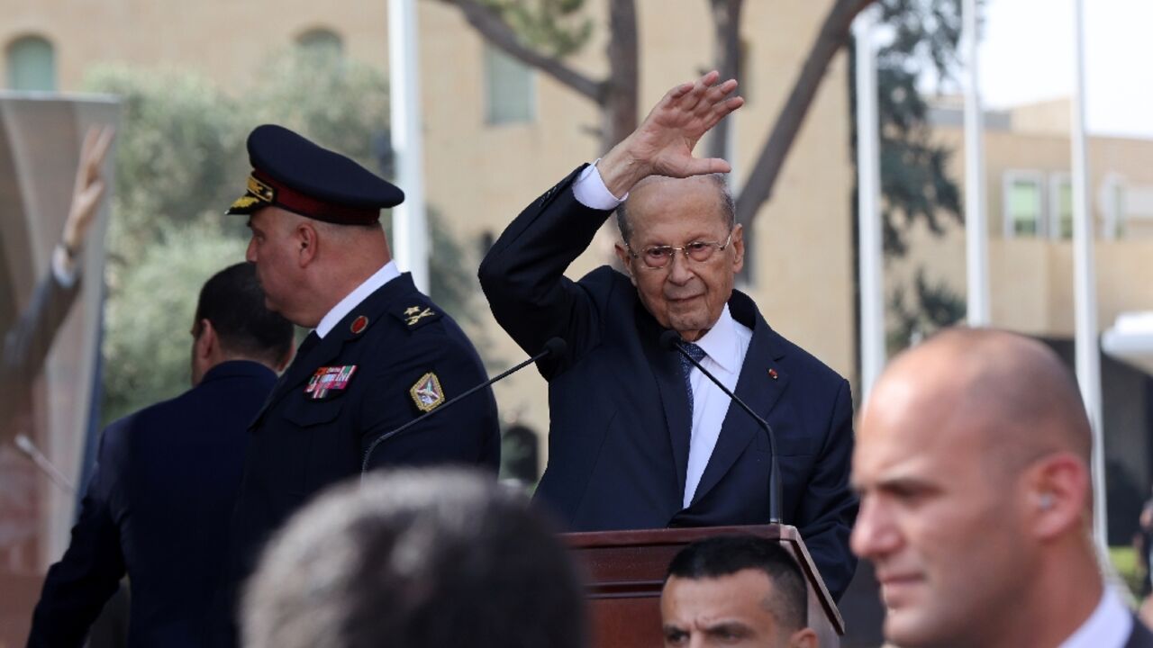Lebanon's President Michel Aoun waves to his supporters  outside the presidential palace in Baabda before delivering a speech to mark the end of his mandate