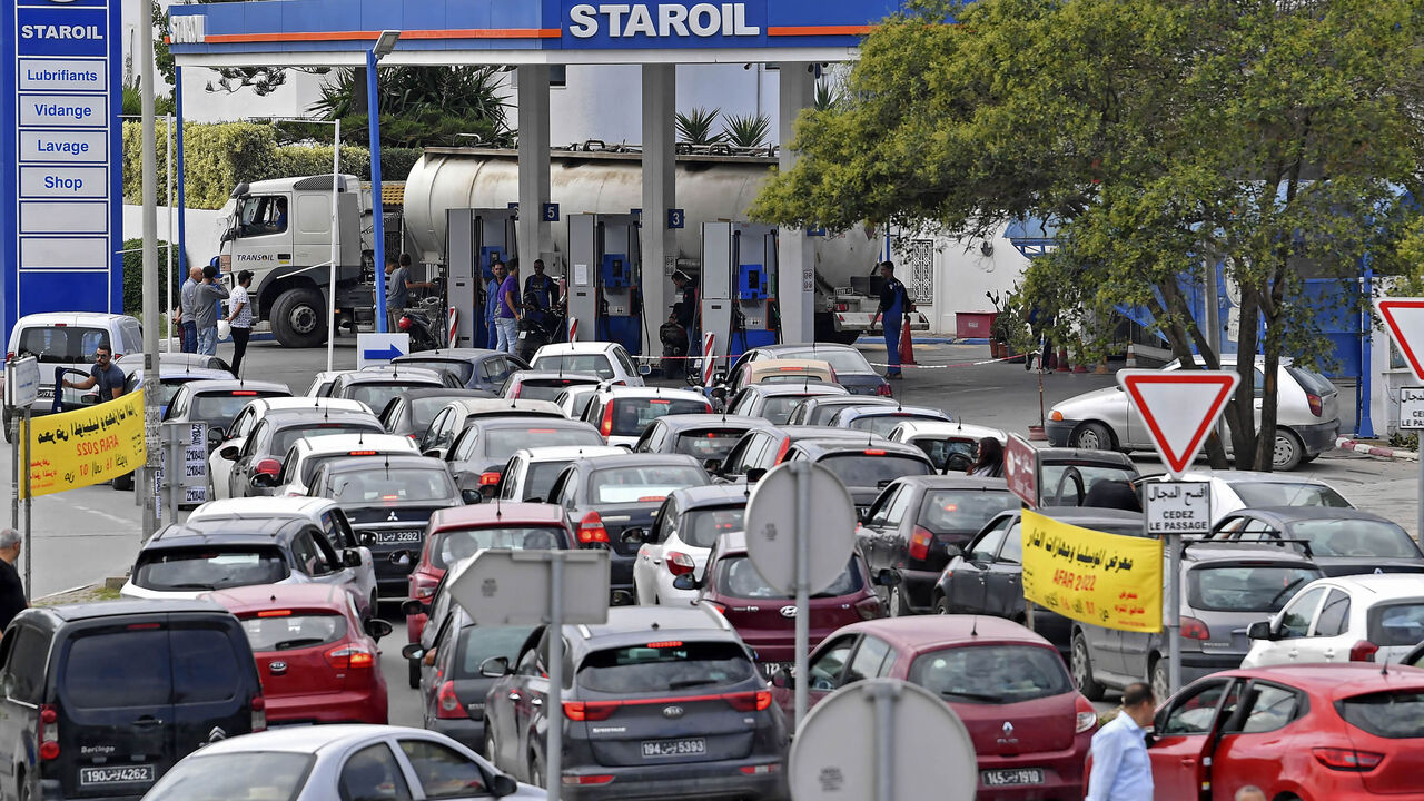Tunisians line up with their vehicles outside a gas station, Tunis, Tunisia, Oct. 13, 2022.
