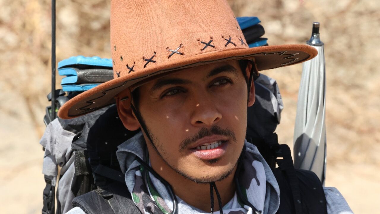 Saudi trekker Abdullah Alsulmi is headed for the World Cup in Qatar -- on foot across the Arabian Peninsula