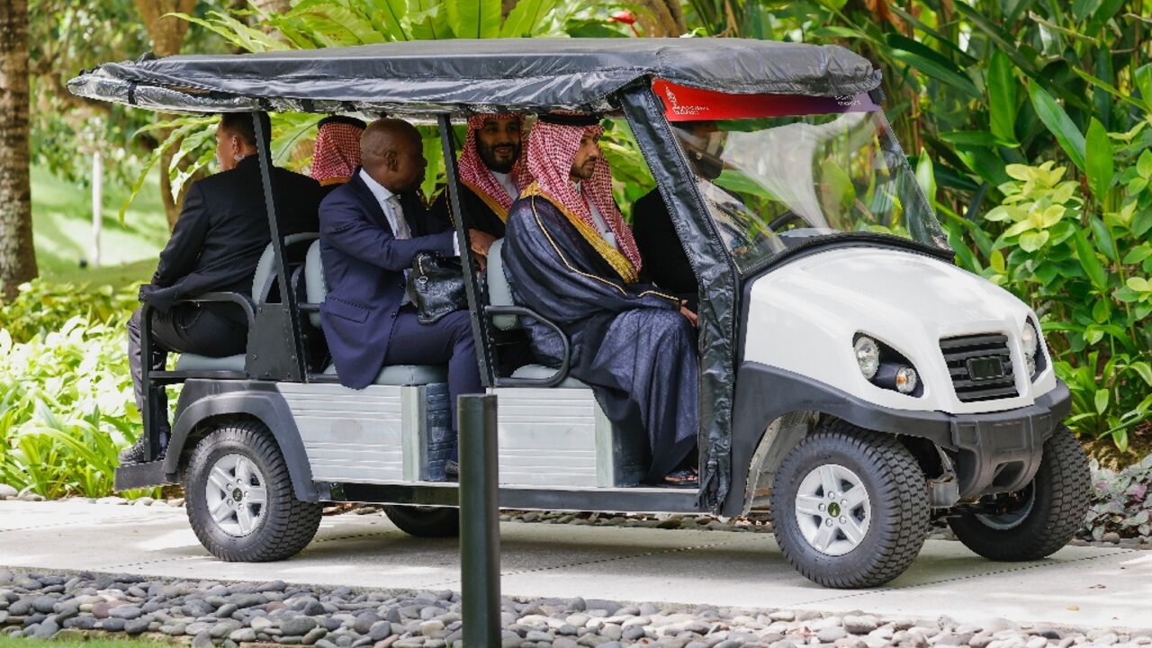 Saudi Arabia's Crown Prince Mohammed bin Salman rides a buggy during the G20 leaders' summit in Bali