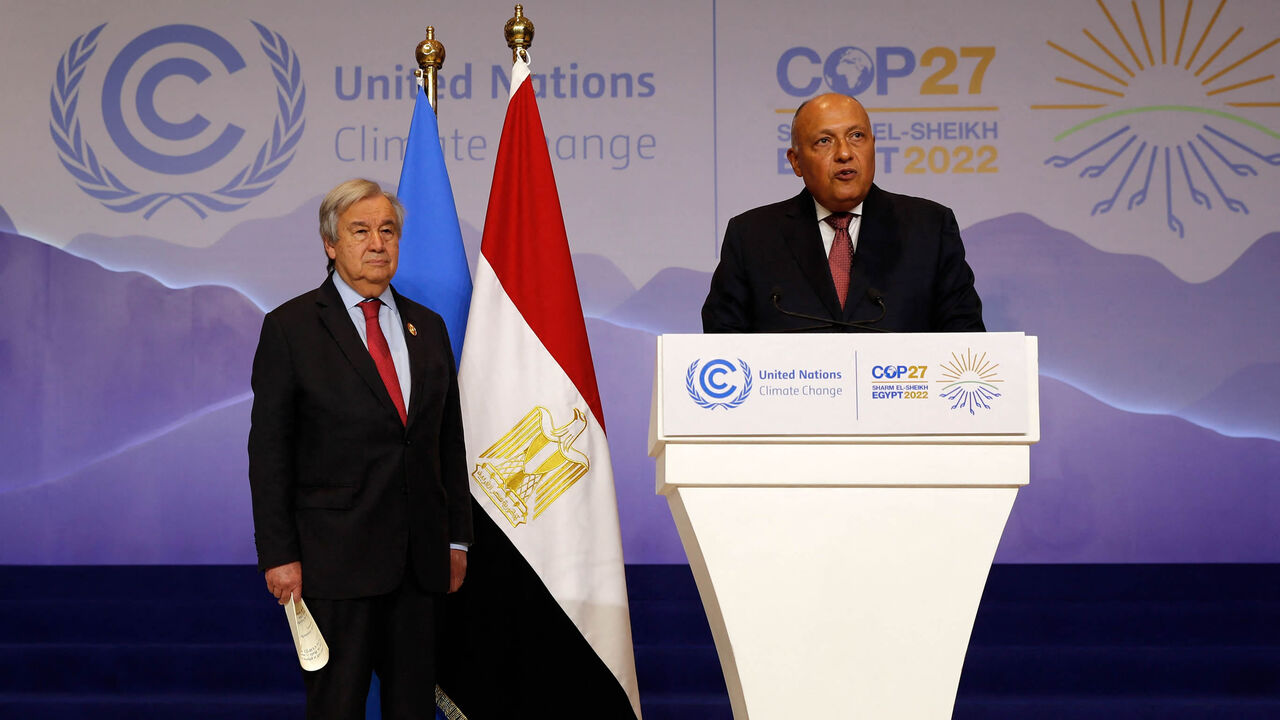 Egypt's Foreign Minister Sameh Shoukry (R) speaks as UN Secretary-General Antonio Guterres listens at a press conference during the COP27 climate conference, Sharm el-Sheikh, Egypt, Nov. 17, 2022.