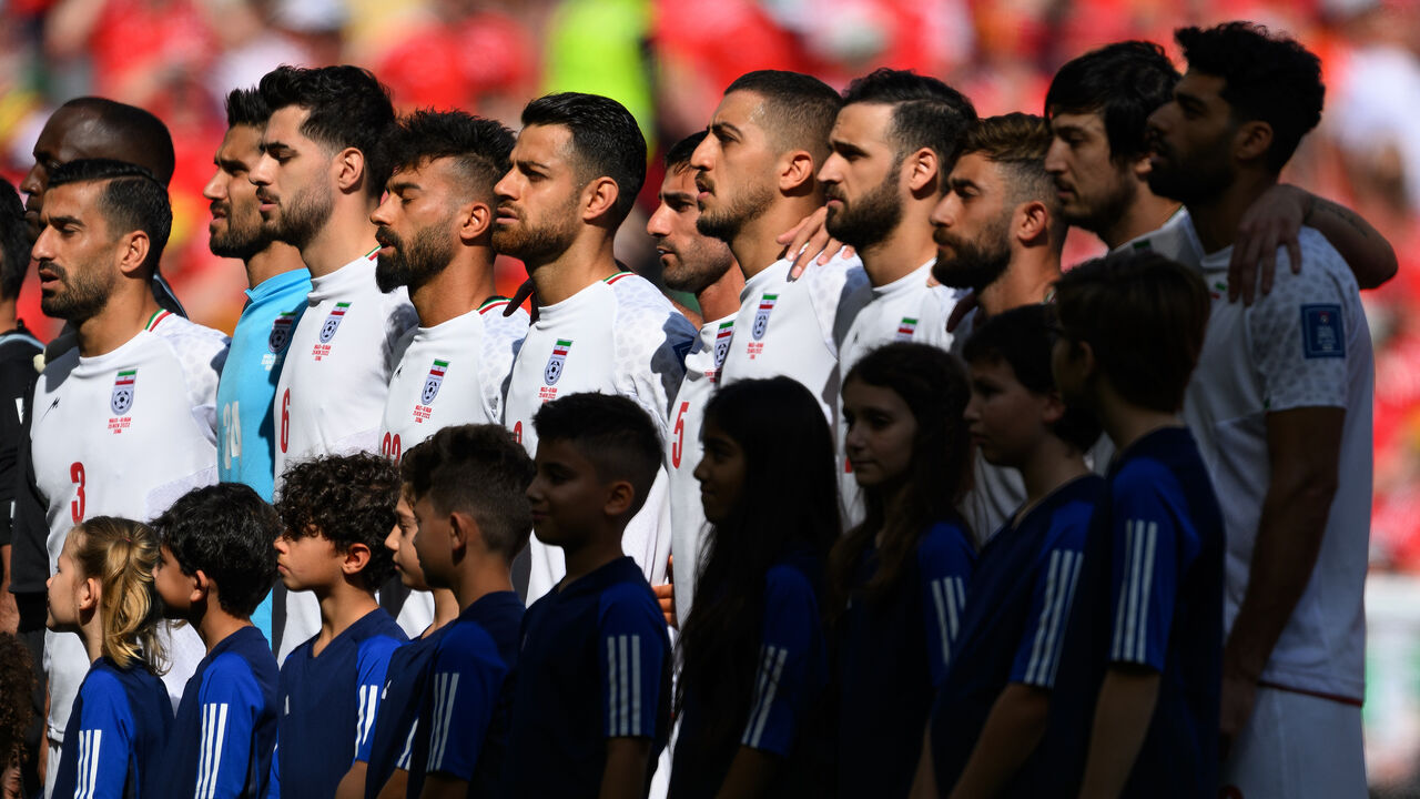 The players of Iran line up for the national anthem prior to the FIFA World Cup Qatar 2022.