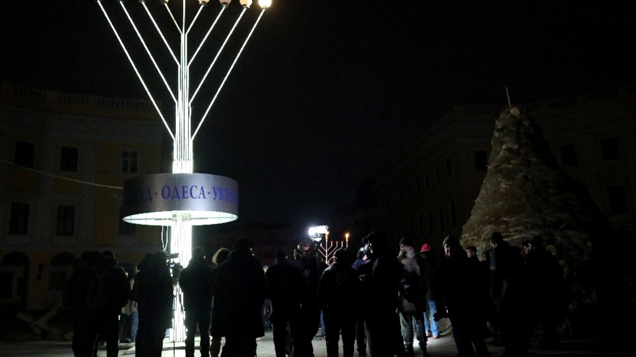 Ukrainian Jews marked the beginning of Hannukah with candle-lighting and a large menorah, amid blackouts caused by persistant bombardment