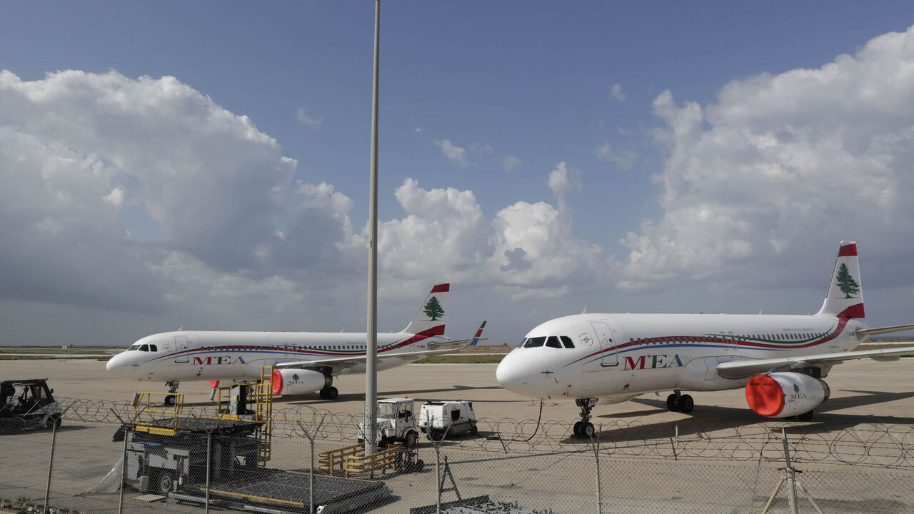 Lebanon's Middle East Airlines planes are parked on the tarmac of Beirut International Airport amid restrictions to combat the coronavirus across the country, Lebanon, March 19, 2020.