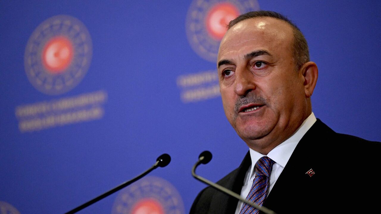 Turkish Foreign Minister Mevlut Cavusoglu addresses a press conference with the NATO Secretary General after their meeting at The Foreign Ministry in Istanbul on Nov. 3, 2022. 