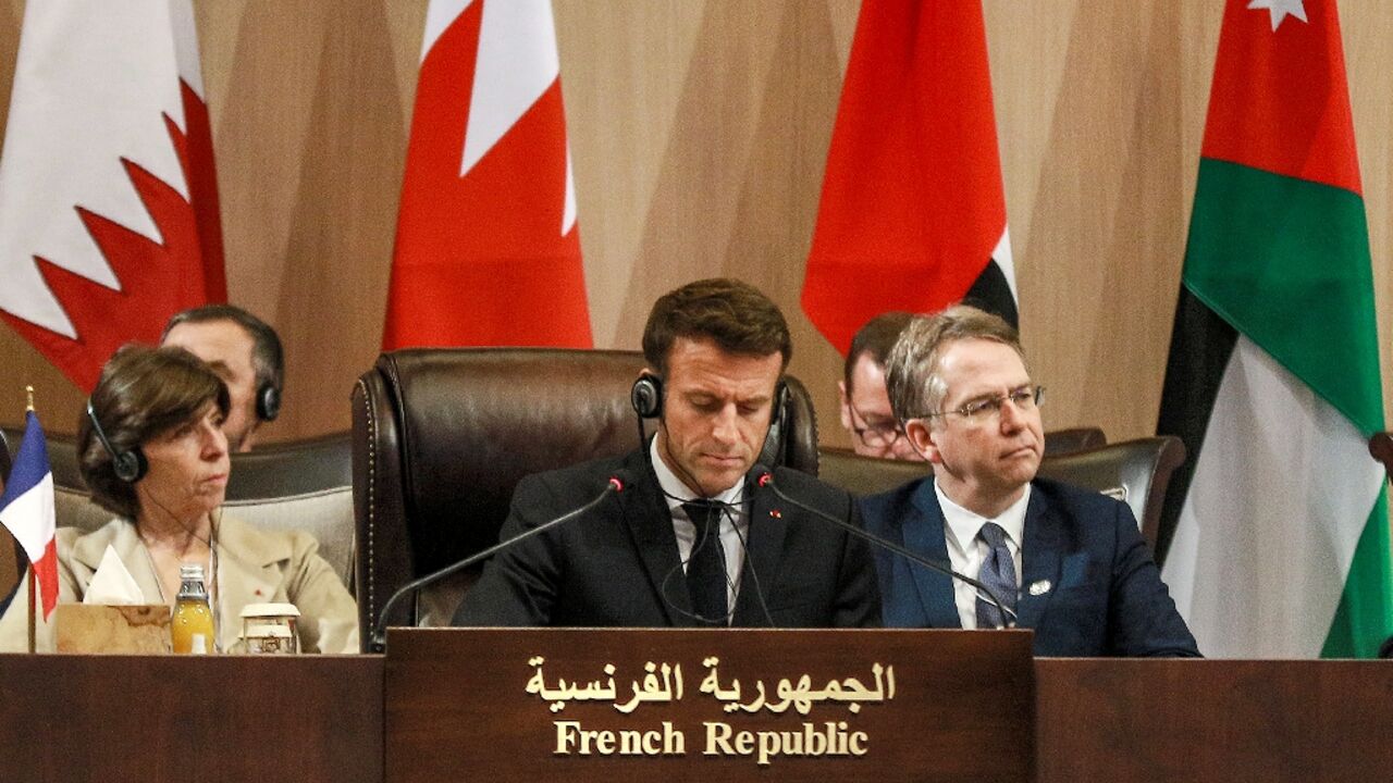 French President Emmanuel Macron attends the "Baghdad Conference for Cooperation and Partnership" in Sweimeh in Jordan on Tuesday