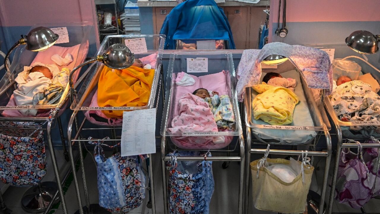 Newborn babies seen inside their cribs at a hospital in the city of Santa Rosa, Phillipines