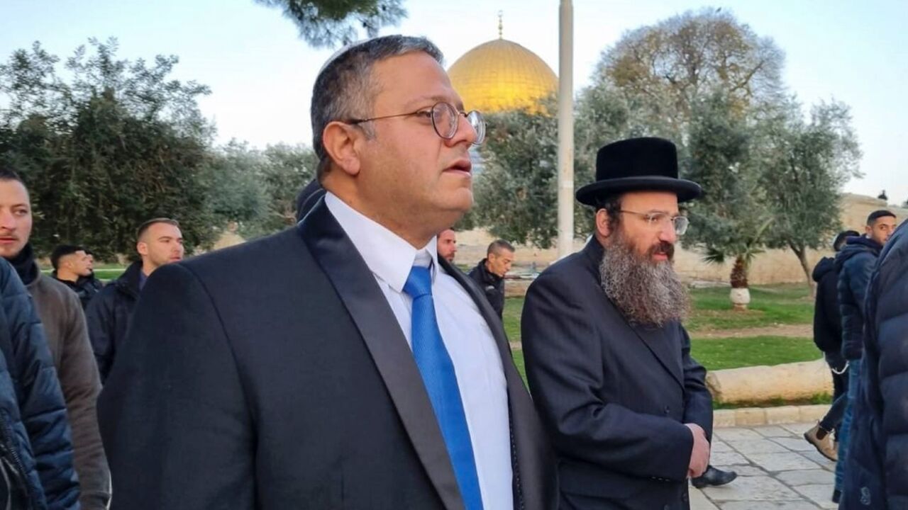 Israeli cabinet minister Itamar Ben-Gvir walks through the courtyard of Jerusalem's Al-Aqsa mosque compound, which Jews know as the Temple Mount 