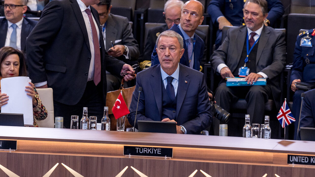 Turkish Defense Minister Hulusi Akar is seen seated at the start of the North Atlantic Council meeting on the final day of the NATO defense ministers' meeting at the NATO headquarters, Brussels, Belgium, Oct. 13, 2022.