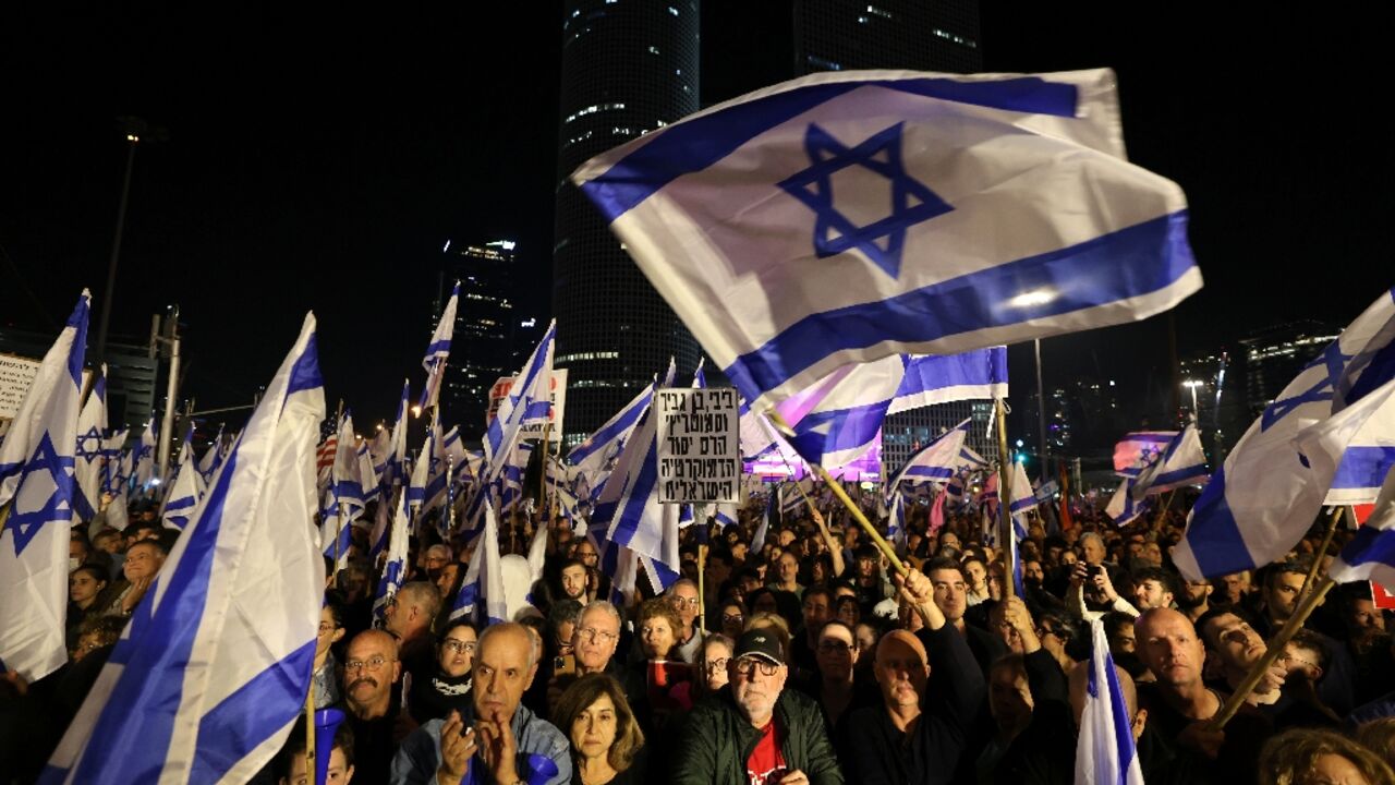 Tens of thousands of Israelis throng central Tel Aviv for the largest protest so far against the most right-wing government in the country's history