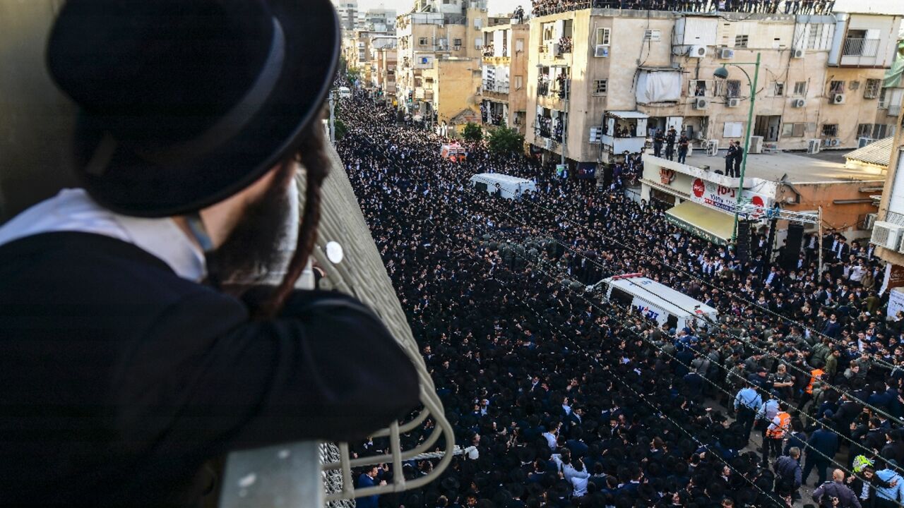 Israeli ultra-Orthodox men  attend the funeral of Rabbi Shimon Baadani, in Bnei Brak near Tel Aviv