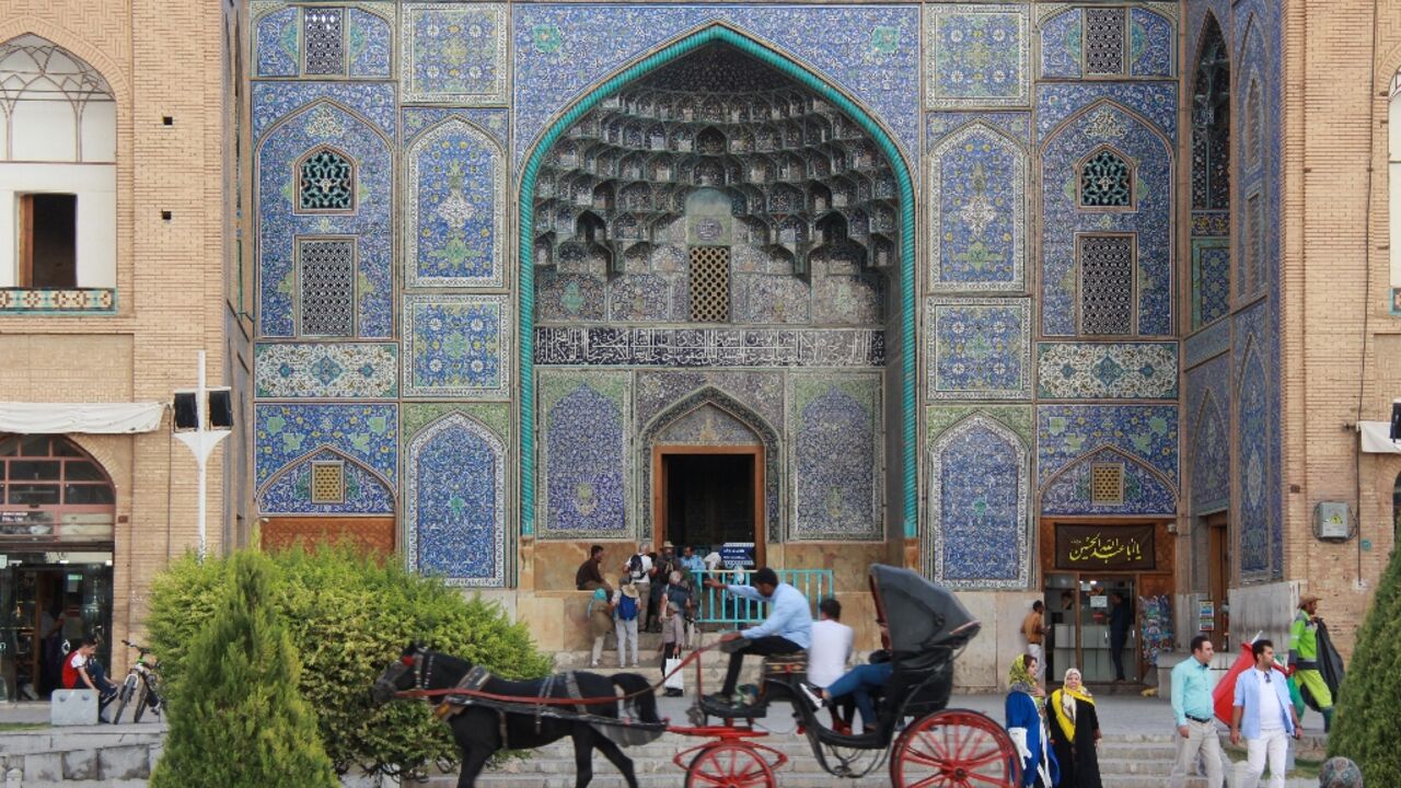 Tourists visit the Lotfallah Mosque on Naqsh-e Jahan Square in the central Iranian city of Isfahan