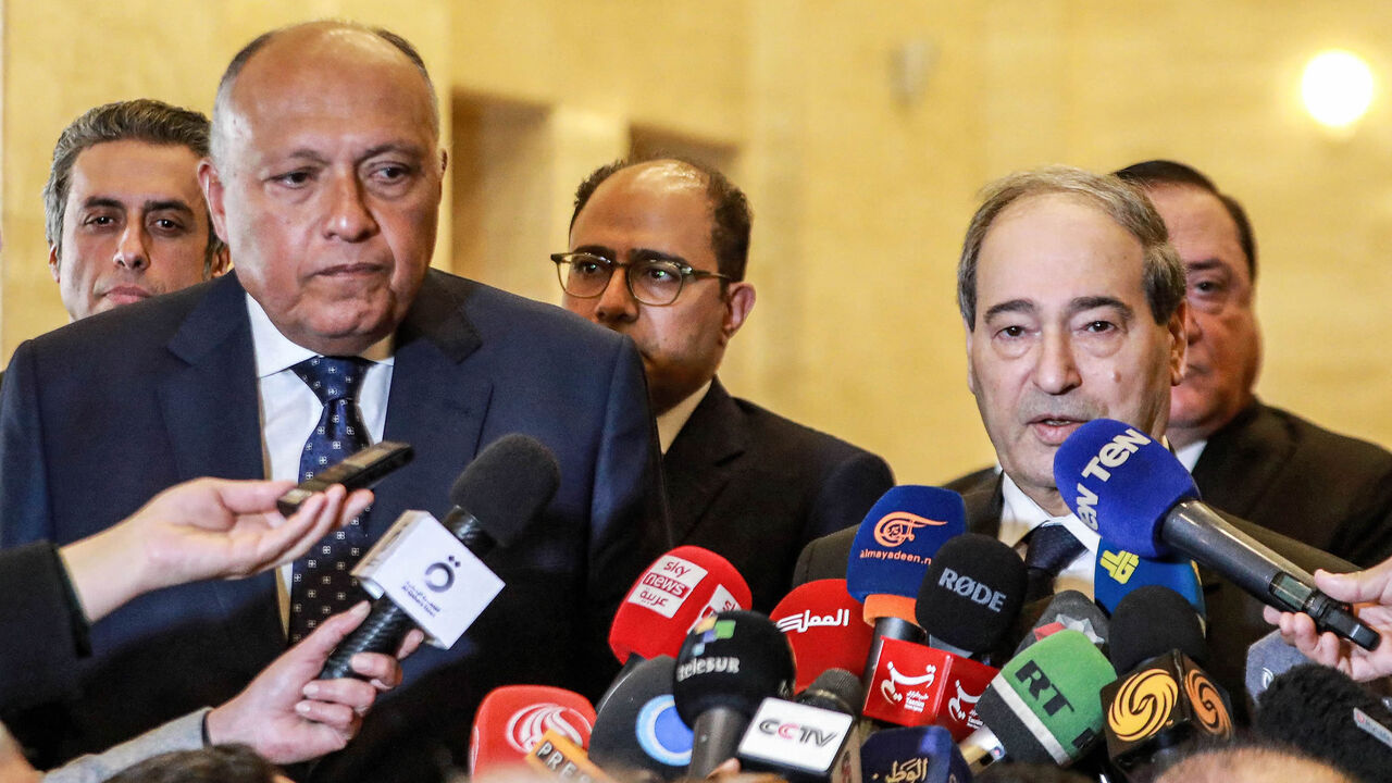 Egyptian Foreign Minister Sameh Shoukry (L) and Syrian Foreign Minister Faisal Mekdad (R) give a press conference at the Foreign Ministry headquarters, Damascus, Syria, Feb. 27, 2023.