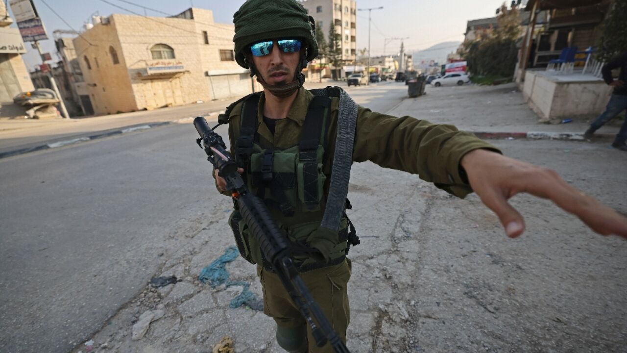 Israeli security forces deploy in Huwara in the occupied West Bank following the shooting death of two Israelis