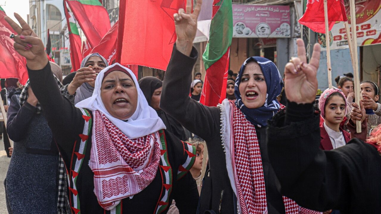 Democratic Front for the Liberation of Palestine (DFLP) supporters rally in Rafah in the Gaza Strip against the Aqaba summit