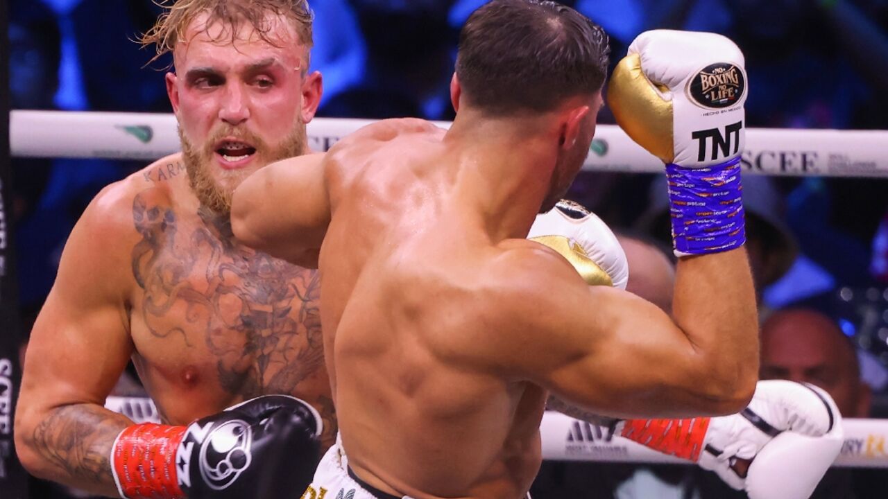 Jake Paul (left) was beaten on points by Tommy Fury (right)