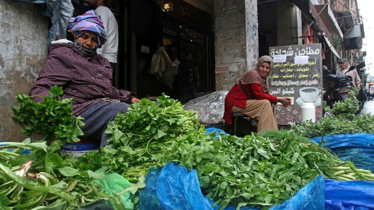 Vendors sell herbs in Lebanon's southern city of Sidon (Saida) -- the country's meltdown has pushed most people into poverty