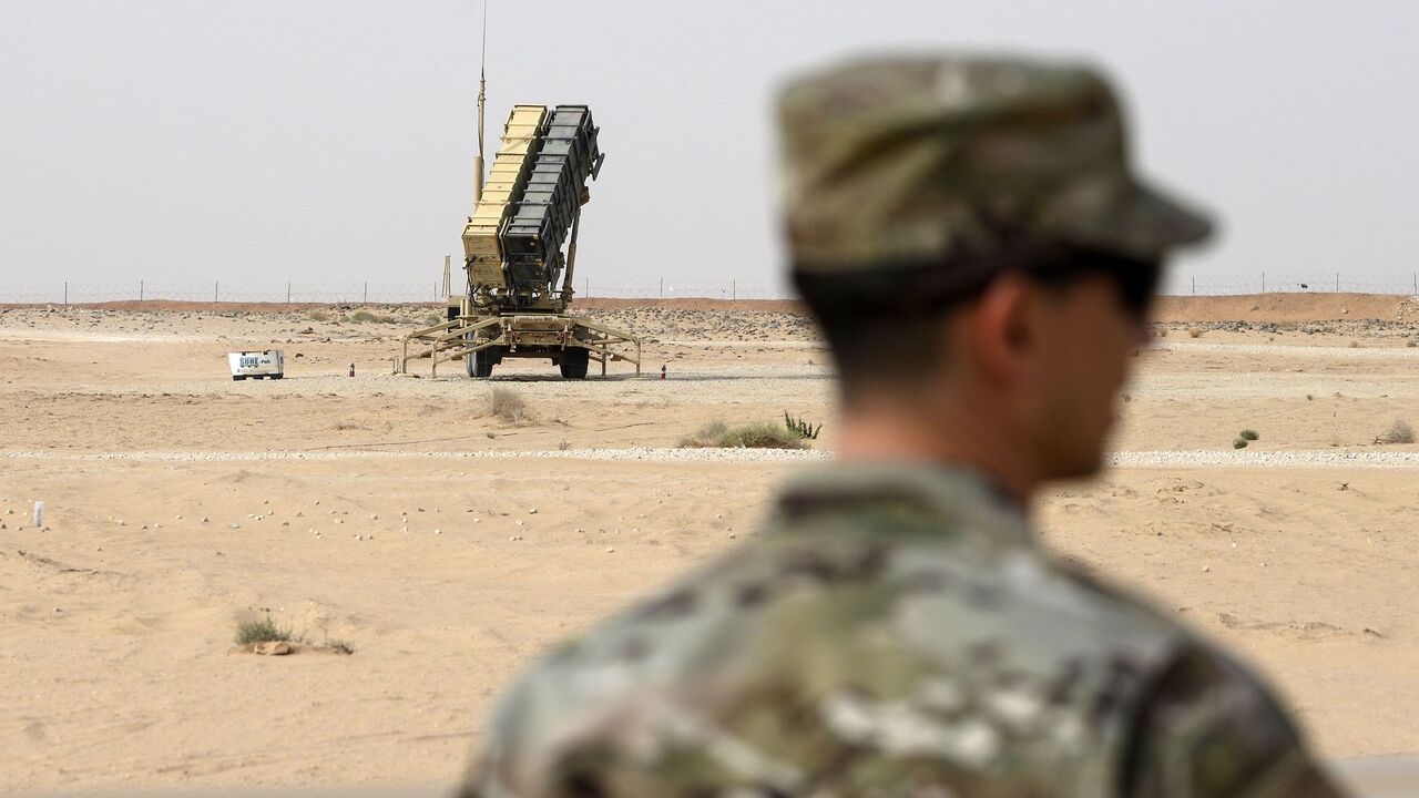 A member of the US Airforce looks on near a Patriot missile battery at the Prince Sultan air base in Al-Kharj, in central Saudi Arabia on February 20, 2020. 