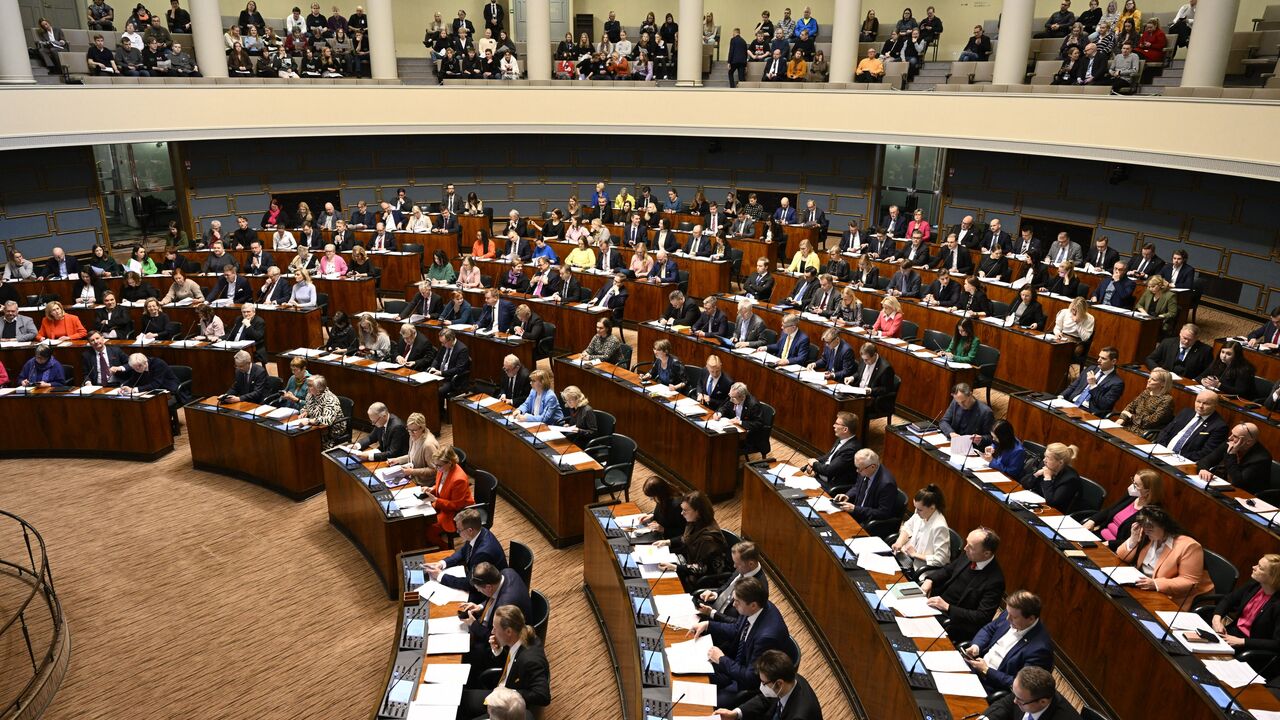 Finnish MPs attend a plenary session of the Finnish parliament on a vote on the country's entry to NATO in Helsinki, Finland on March 1, 2023. - Finland's parliament on March 1 voted overwhelmingly in favour of joining NATO, ahead of ratifications from Hungary and Turkey, increasing the likelihood it will enter the alliance before Nordic neighbour Sweden. Lawmakers approved a law affirming that Finland accepts the terms of the NATO treaty by 184 votes against seven. (Photo by Heikki Saukkomaa / Lehtikuva / 
