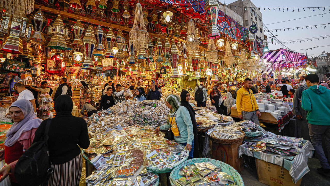 People buy traditional lanterns and foodstuff ahead of the holy Muslim month of Ramadan at the market Sayyida Zeinab district, Cairo, Egypt, March 12, 2023.