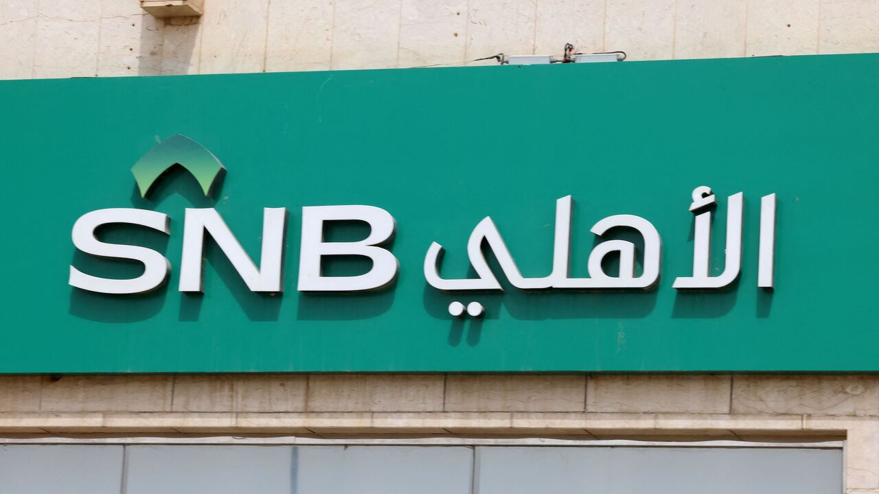 The logo of the Saudi National Bank (SNB) can be seen at a branch in Riyadh on March 27, 2023, after the chairman of SNB, the main shareholder of troubled lender Credit Suisse which was bought out this month, resigned. 