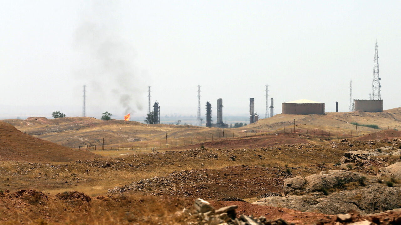A view of an oil refinery in the Iraqi city of Kirkuk, on June 20, 2014. Kurdish forces took control of Kirkuk and other disputed territory as Sunni Arab militants pressed an offensive that has seen them seize a large chunk of Iraq and sweep federal security forces aside. AFP PHOTO/KARIM SAHIB (Photo by KARIM SAHIB / AFP) (Photo by KARIM SAHIB/AFP via Getty Images)
