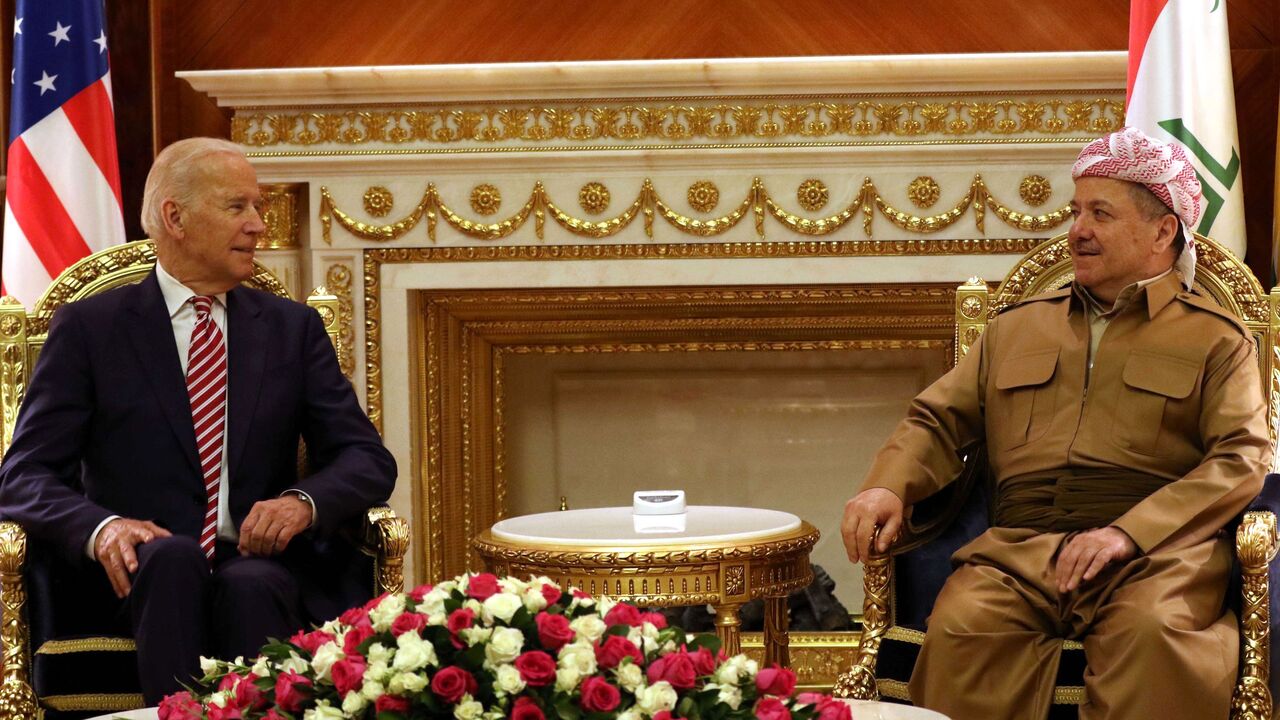 Iraqi Kurdish leader Massud Barzani (R) talks to then-US Vice President Joe Biden during a meeting in Arbil, the capital of the Kurdish autonomous region in Northern Iraq, on April 28, 2016, upon the latter's arrival on a surprise visit. 