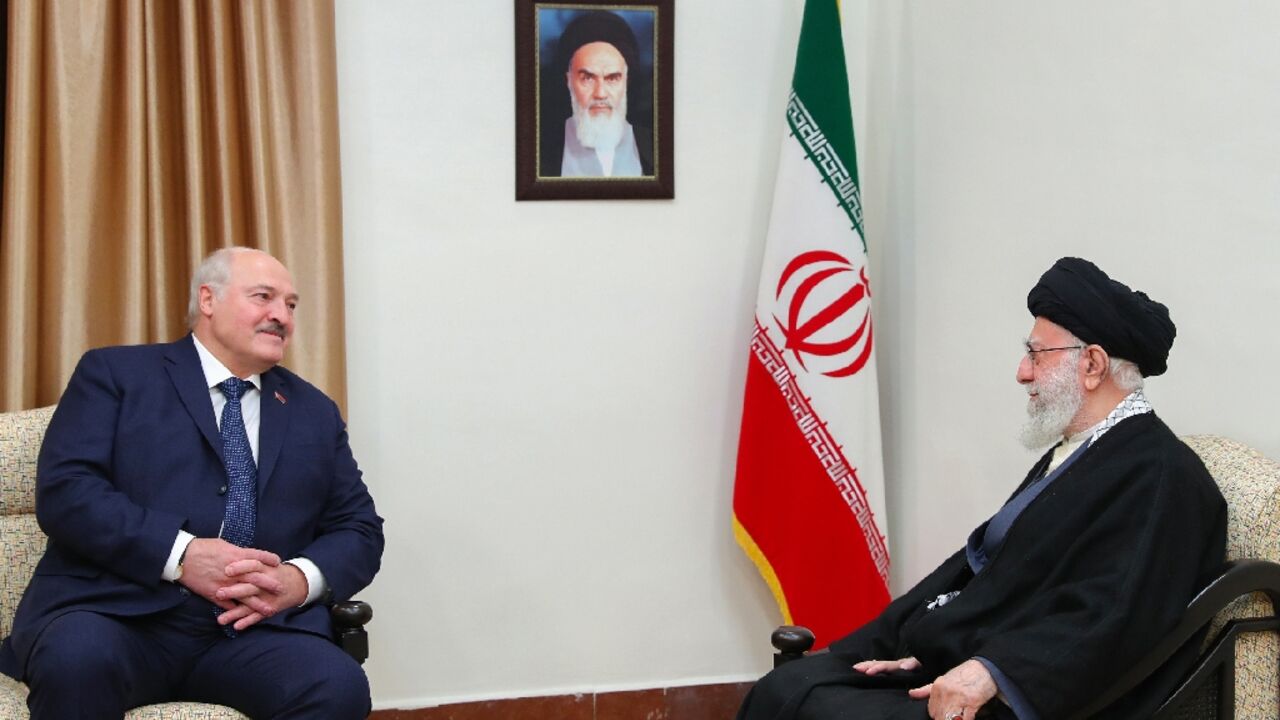 Iran's supreme leader Ayatollah Ali Khamenei (R), who met with Belarus President Alexander Lukashenko in Tehran, said sanctioned countries should 'work together'