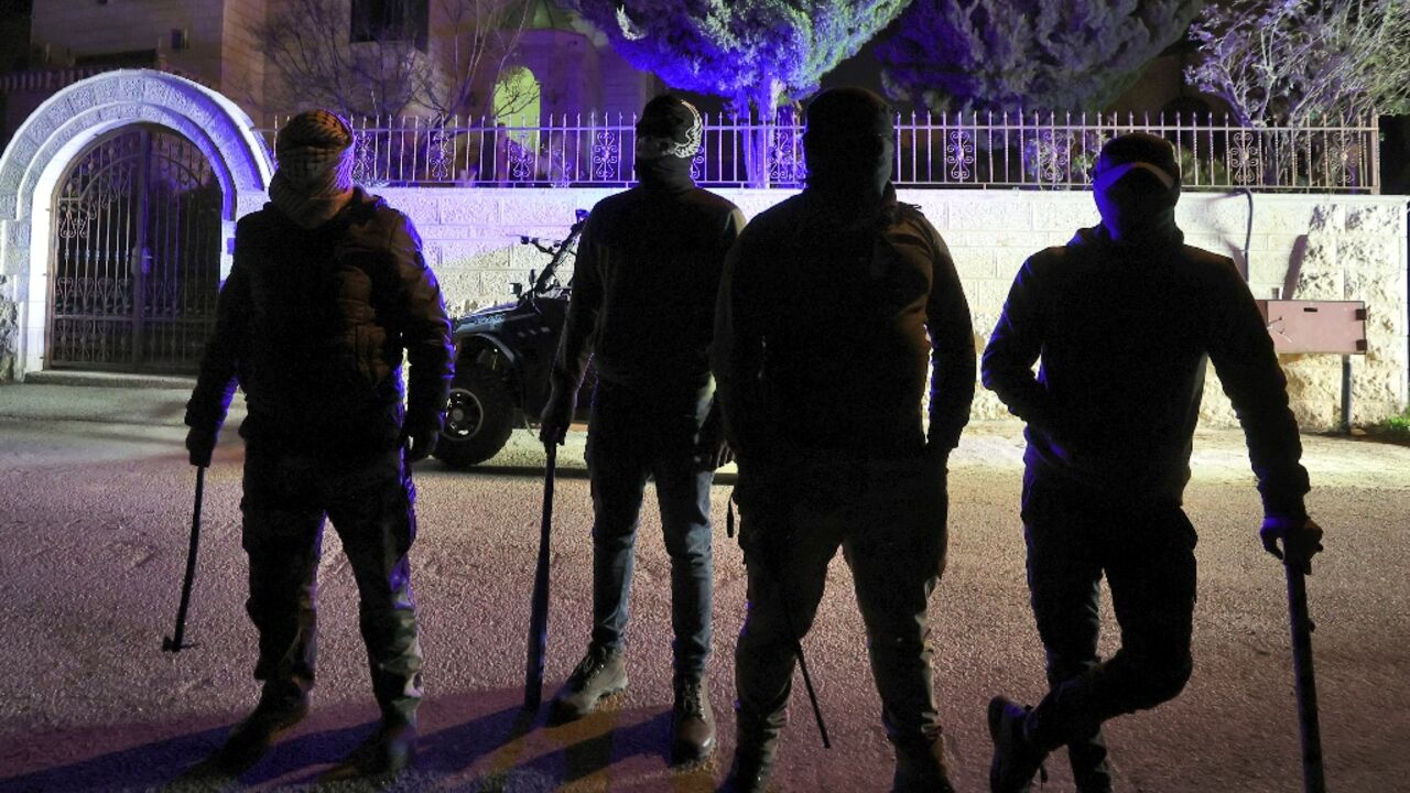 Armed only with sticks and flashlights, a group of young Palestinians mounts night patrols to guard their West Bank village against Israeli settlers following a spate of recent attacks