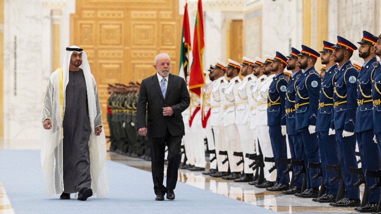 UAE President Sheikh Mohamed bin Zayed Al Nahyan and Brazil's President Luiz Inacio Lula da Silva inspecting the honour guard